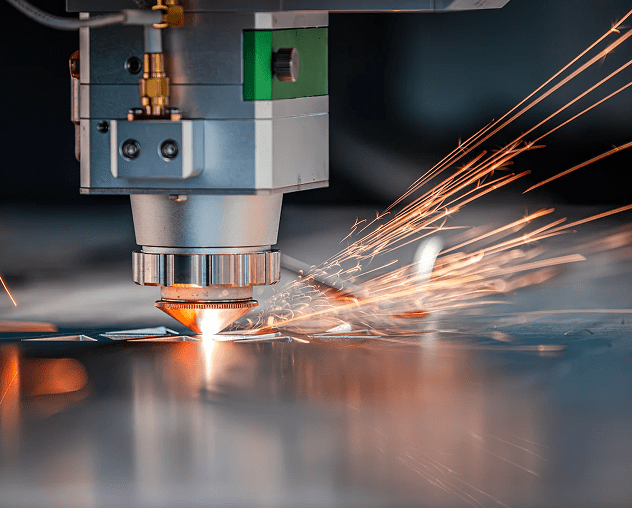 Laser cutting metal with bright sparks.