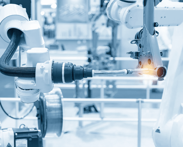 Robotic arm performing industrial welding task.